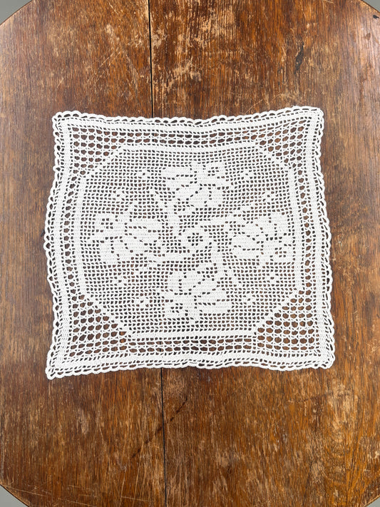 White crochet flower doily